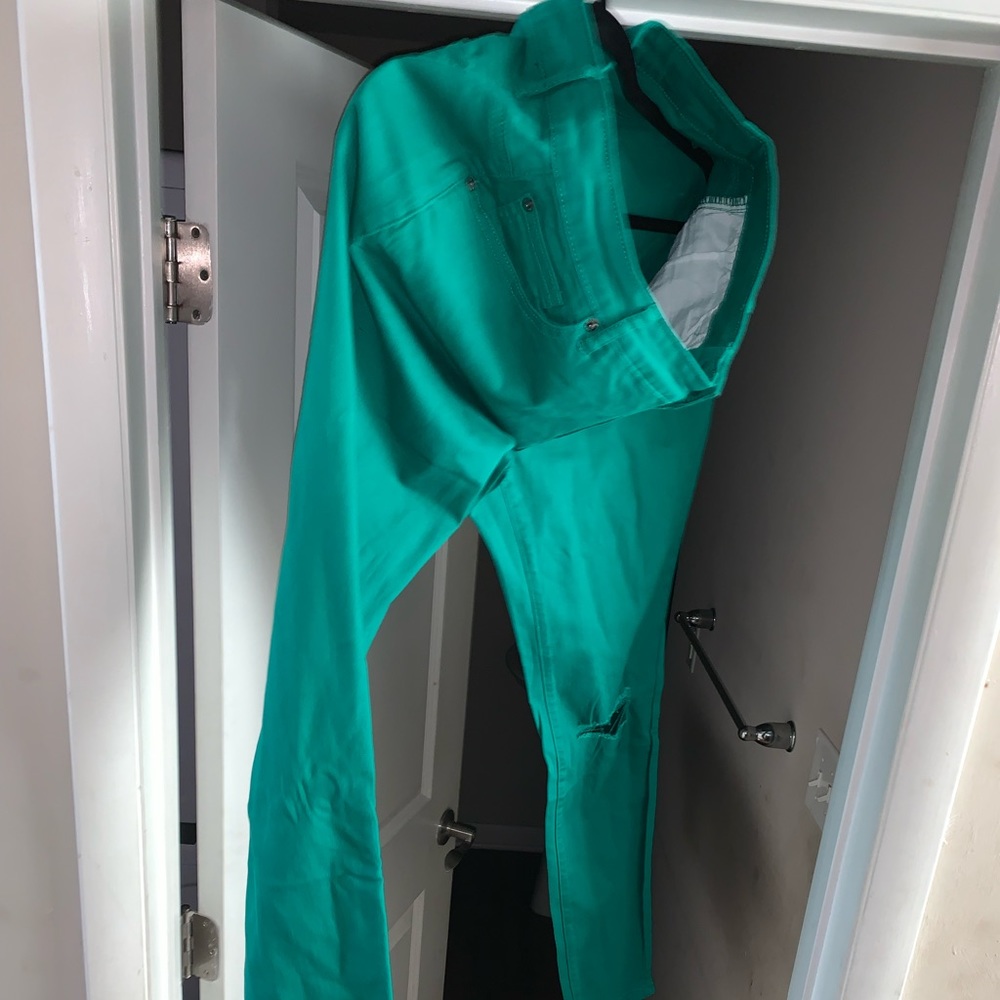 Green skinned fit denim jeans